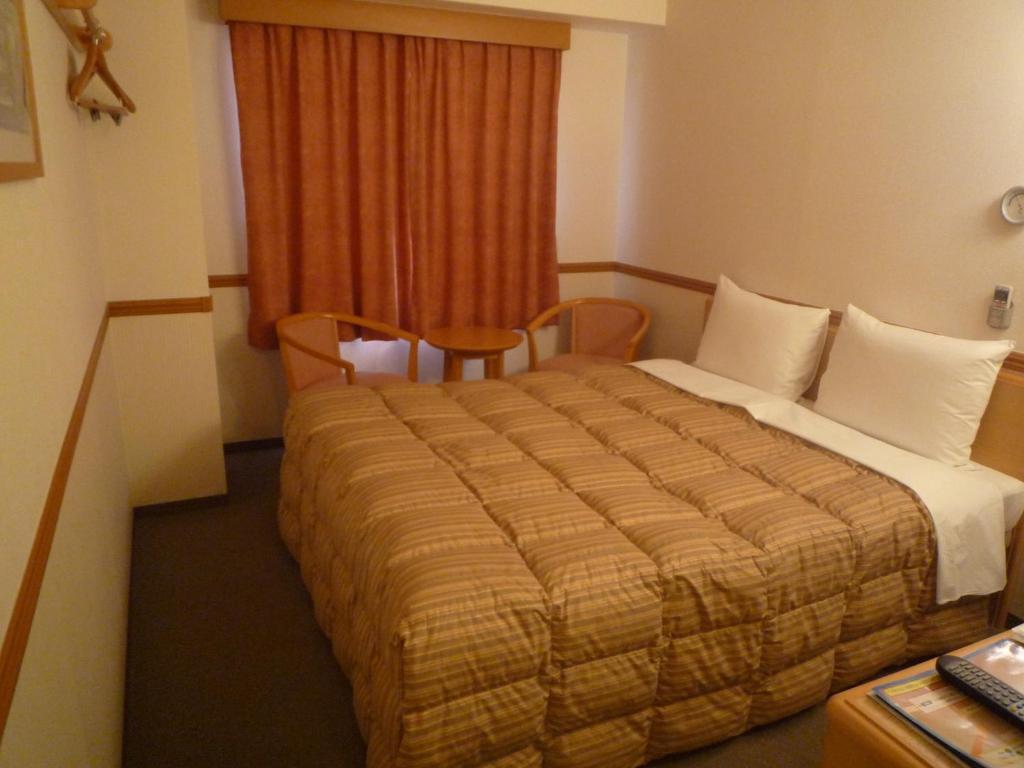Toyoko Inn Hiroshima Heiwa-Odori Pokoj fotografie